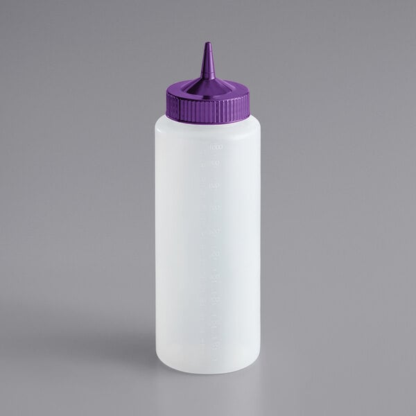 A white plastic bottle with a purple lid and a pointy tip.