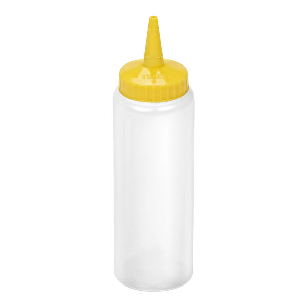 A clear plastic squeeze bottle with a yellow pointed cap.