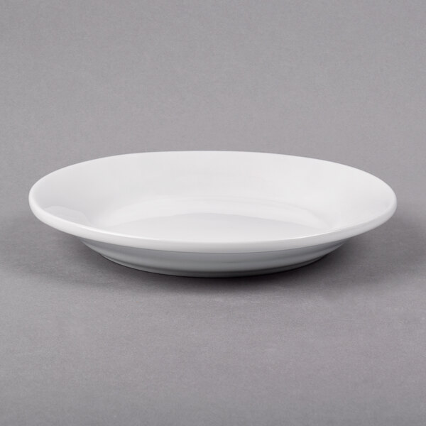 A white Libbey porcelain plate with a rim.
