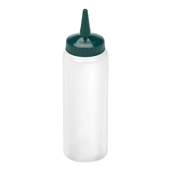 A clear plastic squeeze bottle with a green pointed cap.