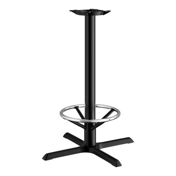 A black cast iron Lancaster Table & Seating bar height table base with a round foot ring.