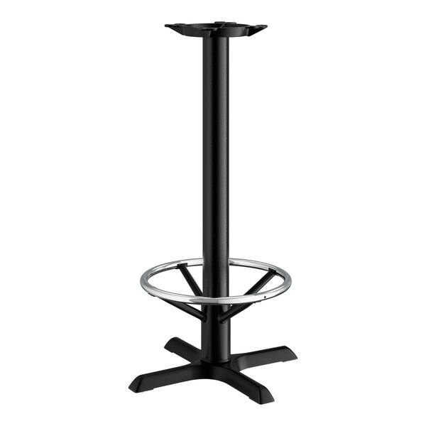 A Lancaster Table & Seating black cast iron bar height table base with a metal foot ring.