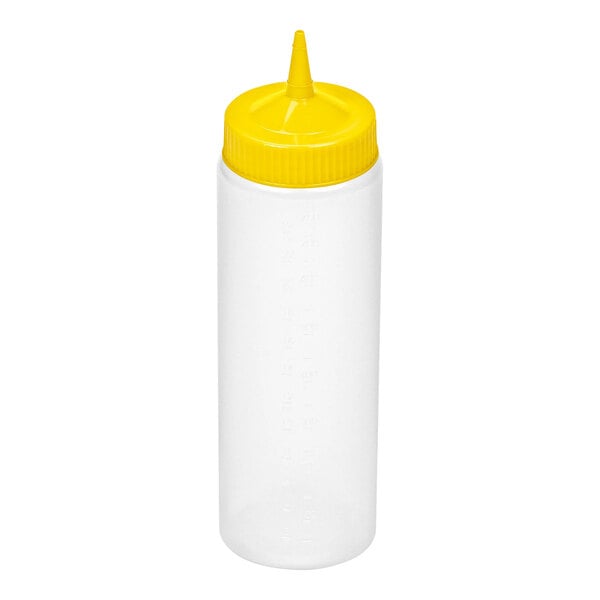 A clear plastic squeeze bottle with a yellow, pointed cap.