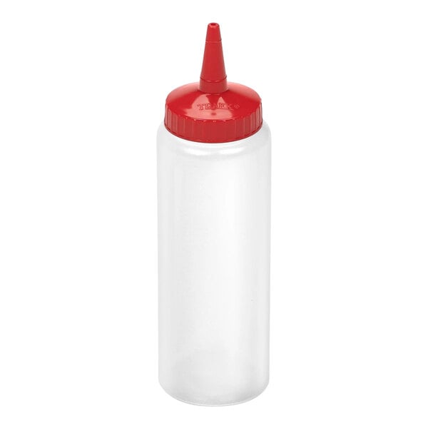A clear plastic squeeze bottle with a red pointed cap.