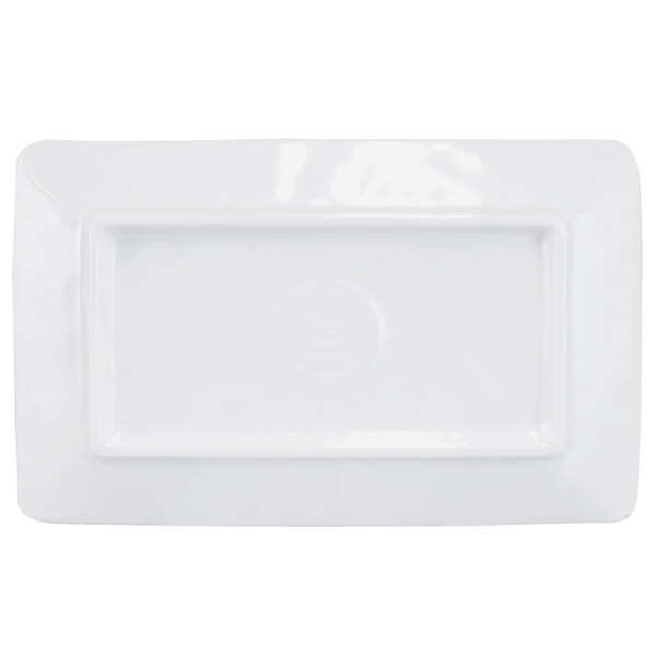 A white rectangular plate with a taupe rectangular logo on it.