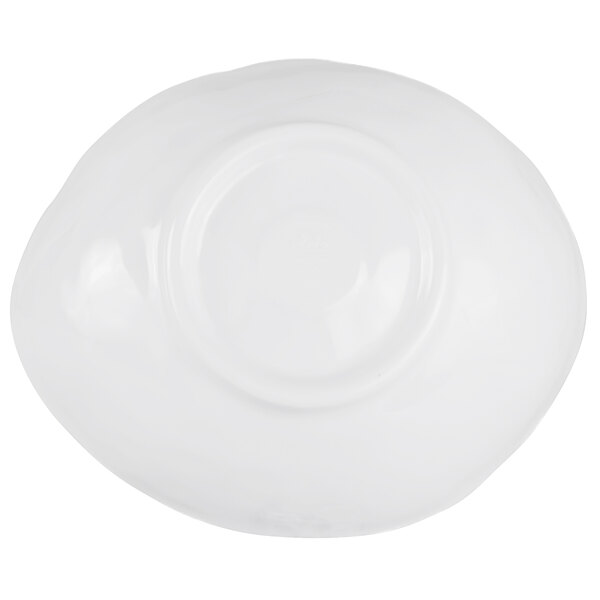 a white plate with a circular pattern