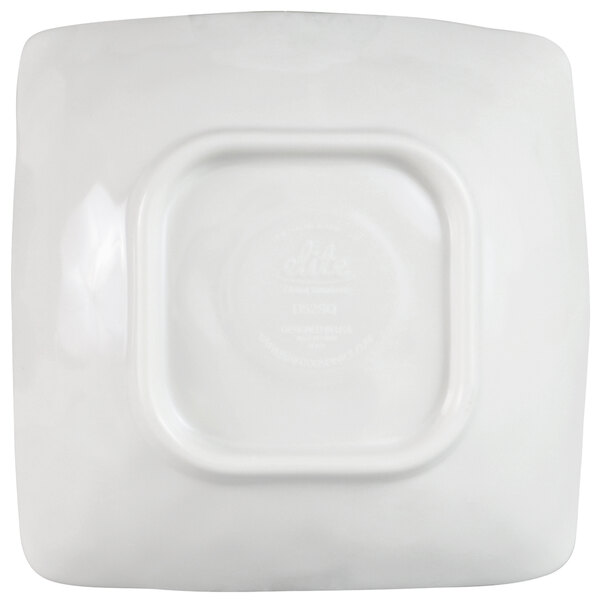 A close-up of a white square container with a square center.