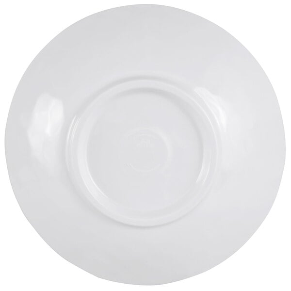 A taupe melamine bowl with a round rim on a white surface.