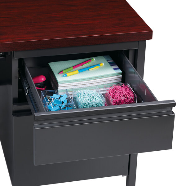 A charcoal left corner pedestal desk with a drawer and file cabinet full of stationery.