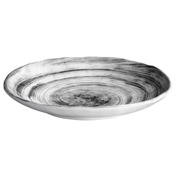 An Elite Global Solutions black and white oval melamine plate with a swirl design.