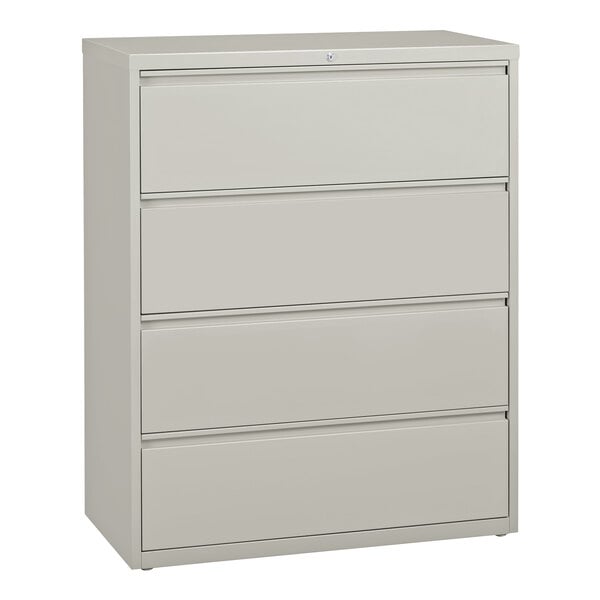 A gray file cabinet with four drawers.