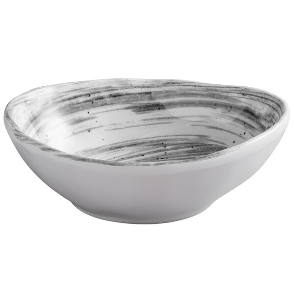 A white oval melamine bowl with black stripes.