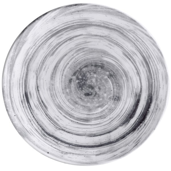 A white and black melamine plate with swirly designs on it.
