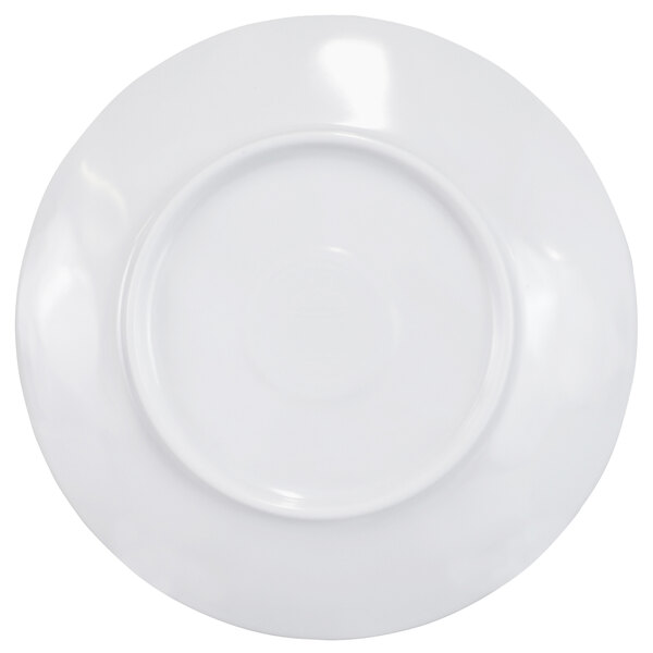 A white plate with a round rim.