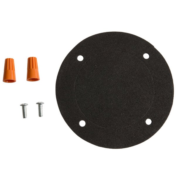 A black plastic circle with screws and nuts.