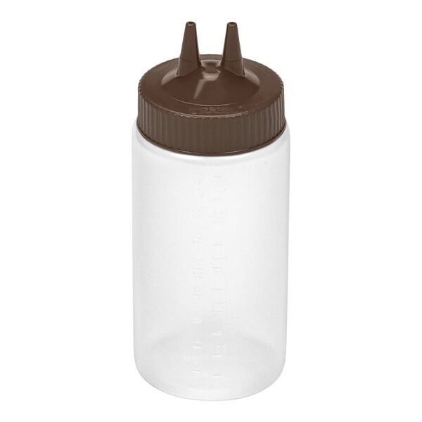 A clear plastic squeeze bottle with a brown cap featuring two pointed dispensing tips.
