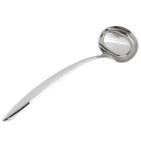 a silver ladle with a long handle