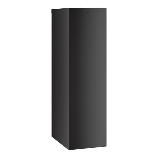A tall, black four-drawer vertical letter file cabinet.