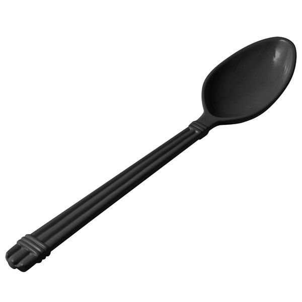 A black spoon with a long handle.