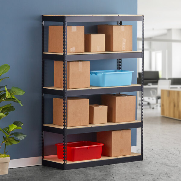 A black metal Hirsh Industries boltless shelving unit with brown boxes on a shelf.