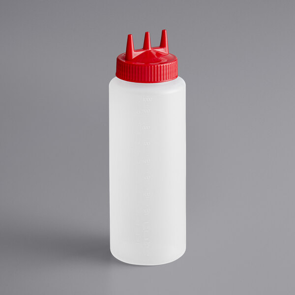 A white plastic Vollrath Tri Tip squeeze bottle with a red cap.