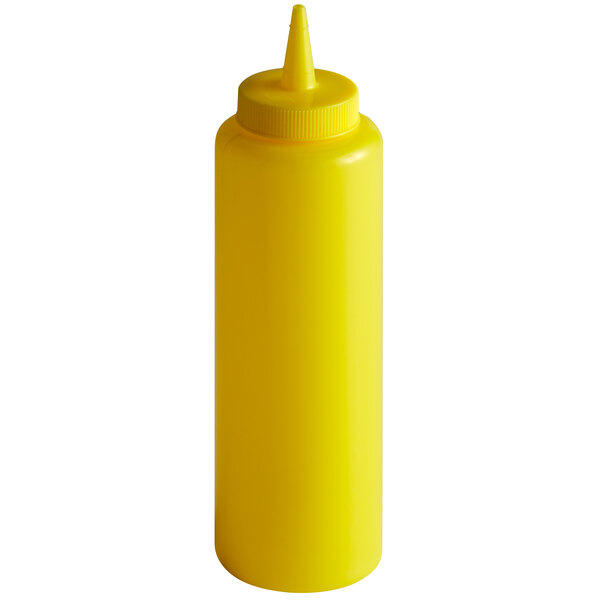 A yellow plastic Vollrath squeeze bottle with a small cone tip.