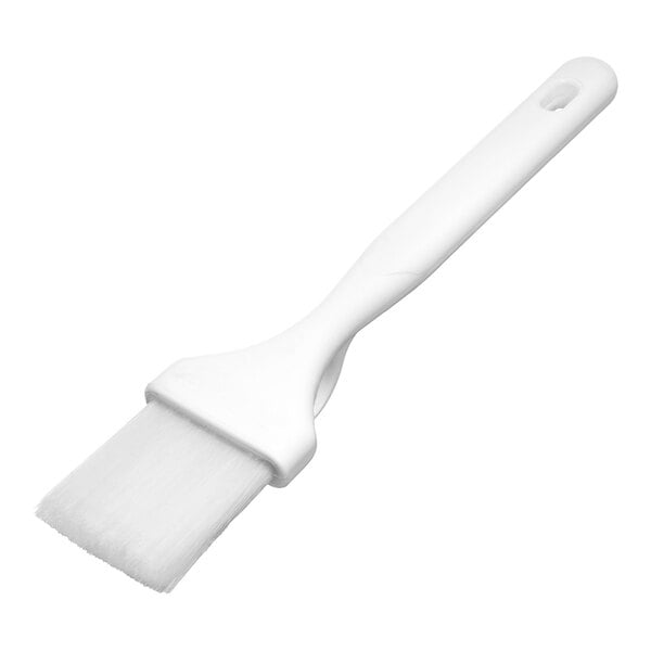 A white brush with a flat, wide head and nylon bristles, featuring a long handle with a hole for hanging.