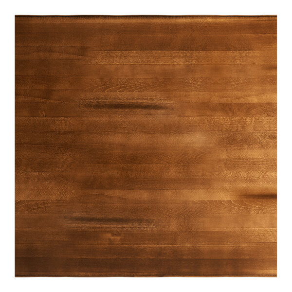 A square solid wood bar height table with a rustic walnut finish and live edge design.