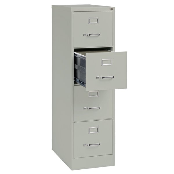 A gray Hirsh Industries file cabinet with three drawers open.