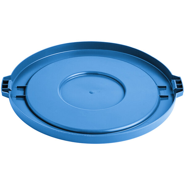 A blue plastic lid for a circular commercial trash can.