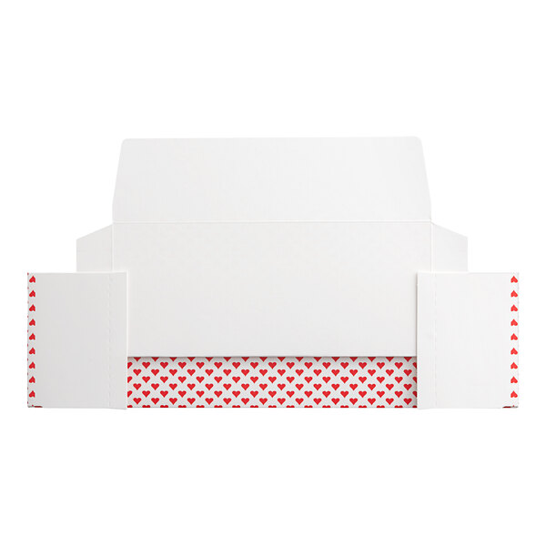 A white rectangular Valentine's Day candy box with red hearts on it.
