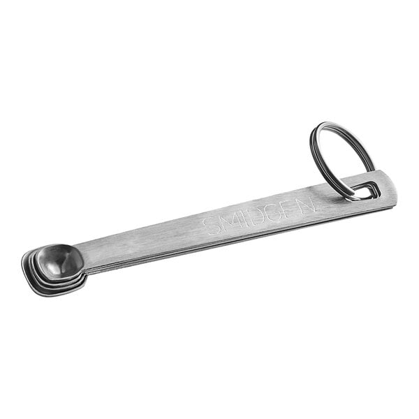 A Tablecraft stainless steel spice measuring spoon set on a metal key ring.