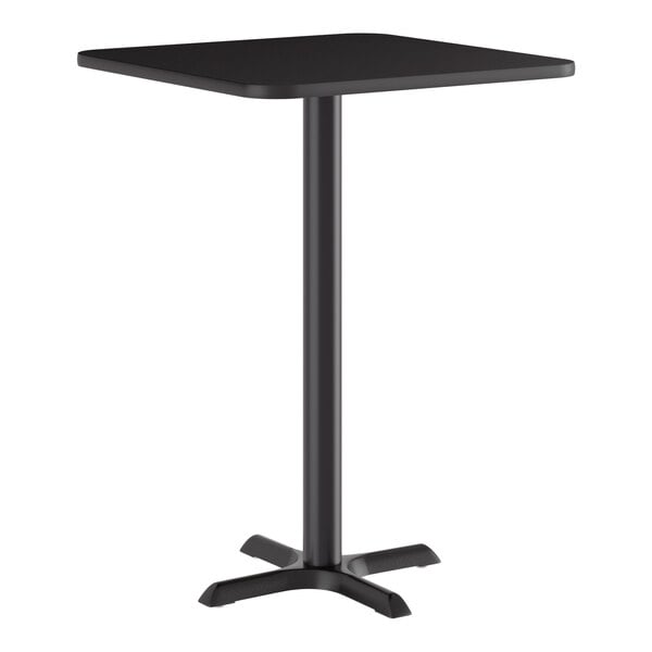 A square black bar height table with a single central pedestal and a 22-inch cast iron base.