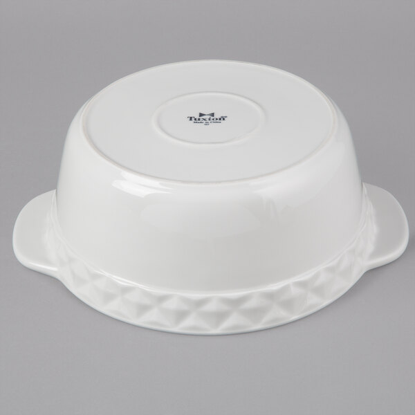 a white bowl with a logo on it