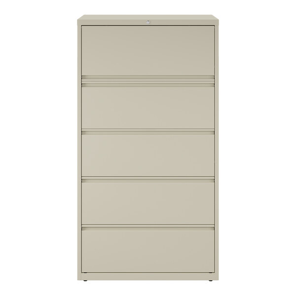 A putty-colored five-drawer lateral file cabinet with roll-out binder storage.