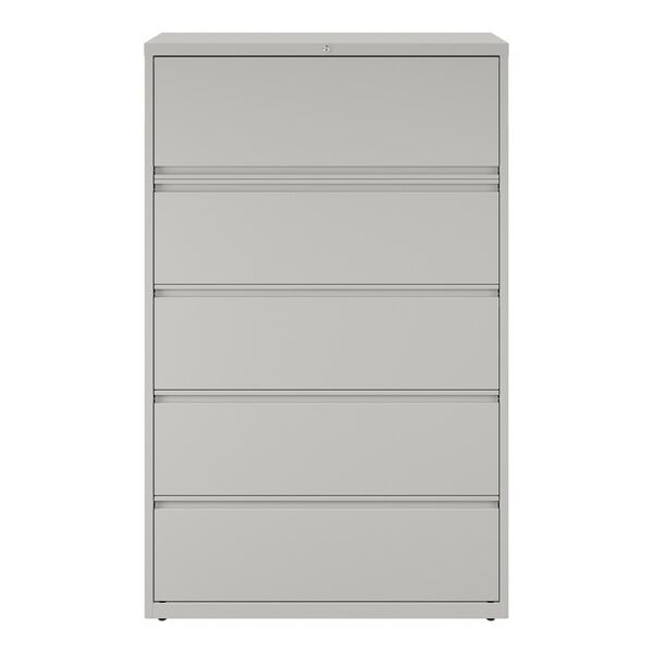 A gray five-drawer lateral file cabinet with roll-out binder storage.