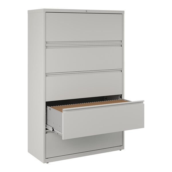 A gray five-drawer lateral file cabinet with one drawer open, designed for office storage and organization.
