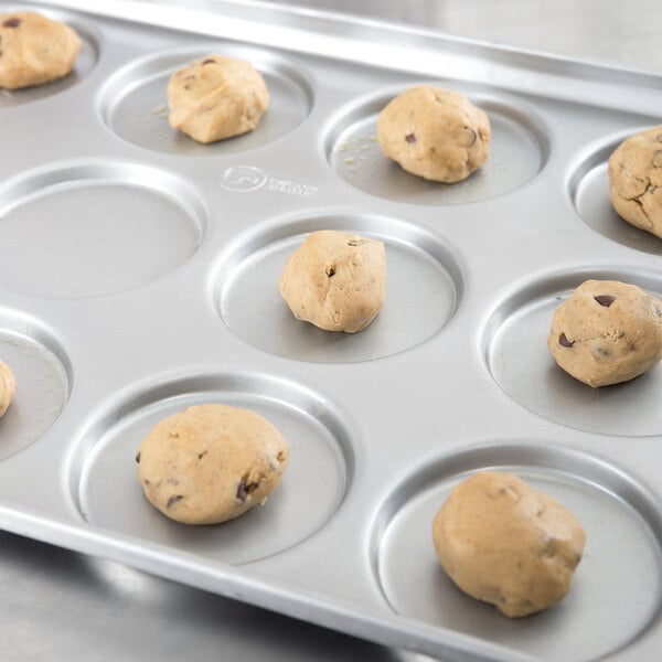 A Chicago Metallic pan filled with cookie dough.