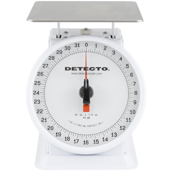 A white Cardinal Detecto portion scale with a black dial and black text.