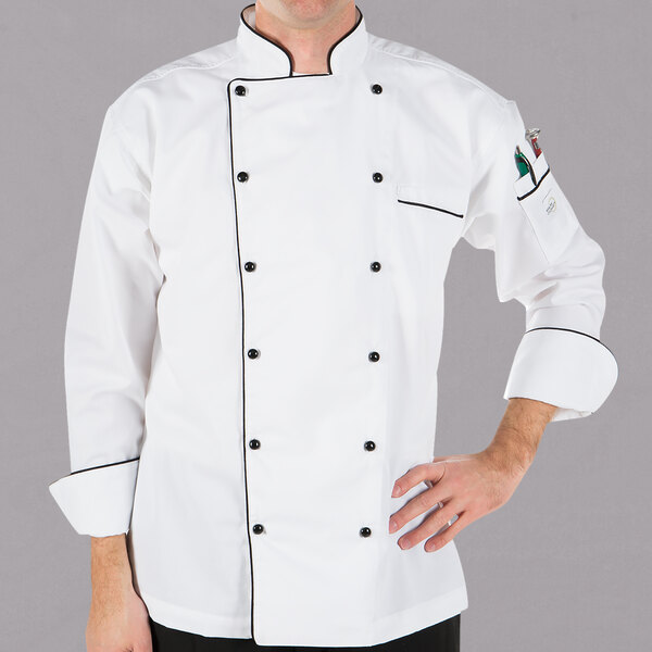 A man wearing a Mercer Culinary Renaissance chef's coat.