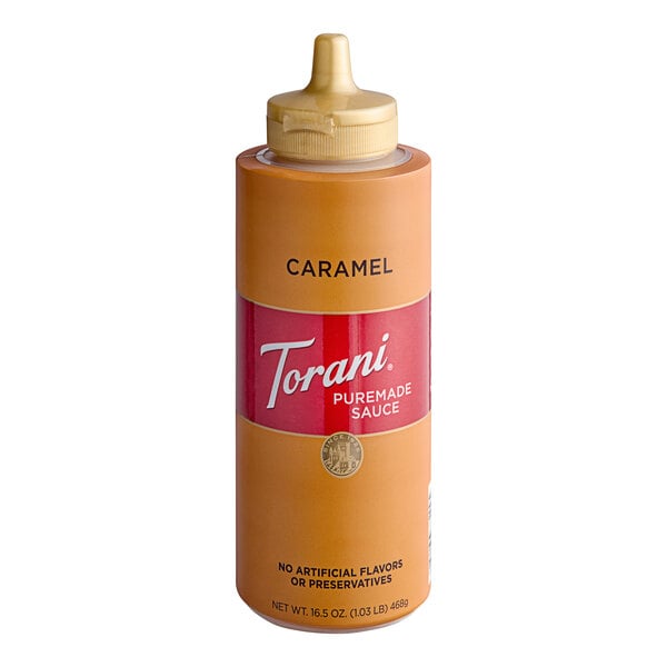 A bottle of Torani Puremade Caramel Flavoring Sauce with a lid.