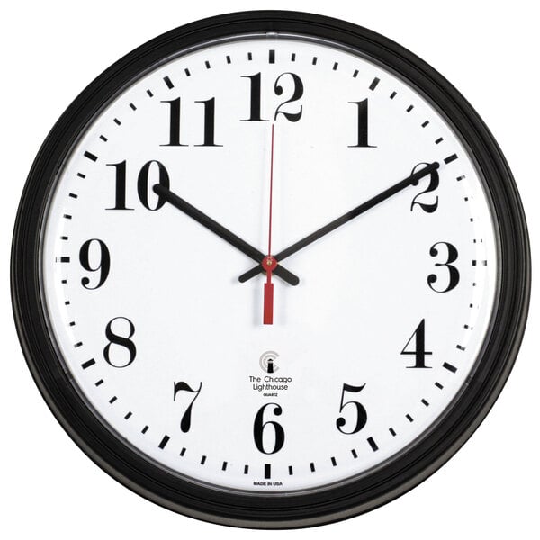 A black and white clock with red numbers on a white background.