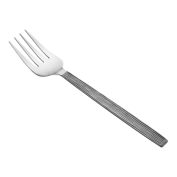 A close-up of an American Metalcraft stainless steel cold meat fork with a wavy handle.