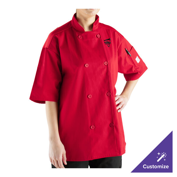 A woman wearing a red Mercer Culinary chef's coat with a mesh back.
