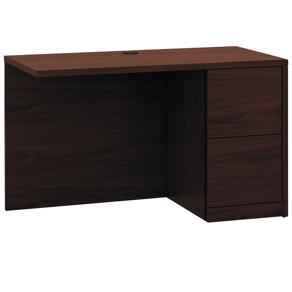 A mahogany HON desk return with full height pedestal.