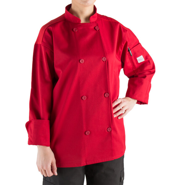 A woman wearing a Mercer Culinary Millennia Air red chef coat.
