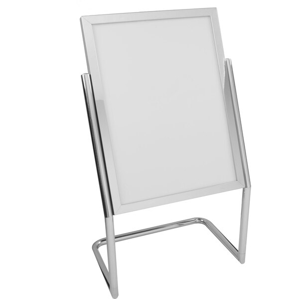 A white board on a chrome double pedestal sign stand.