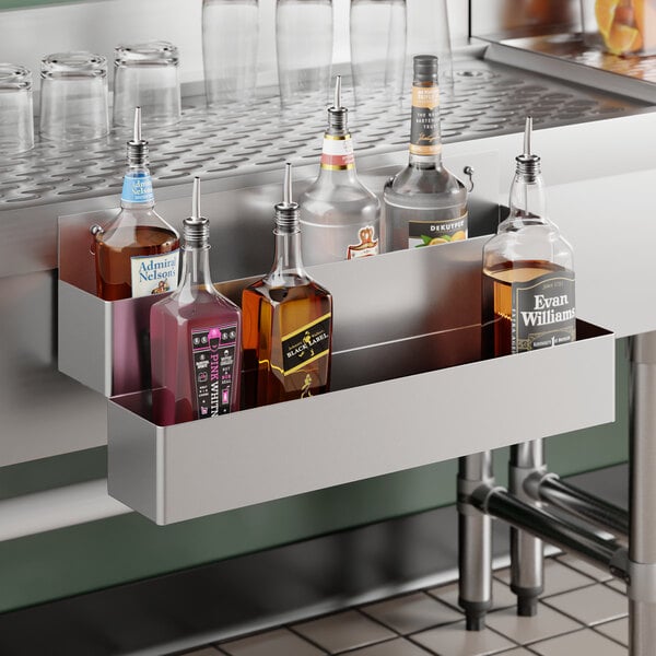 A 22-inch stainless steel double tier speed rail holding several liquor bottles.