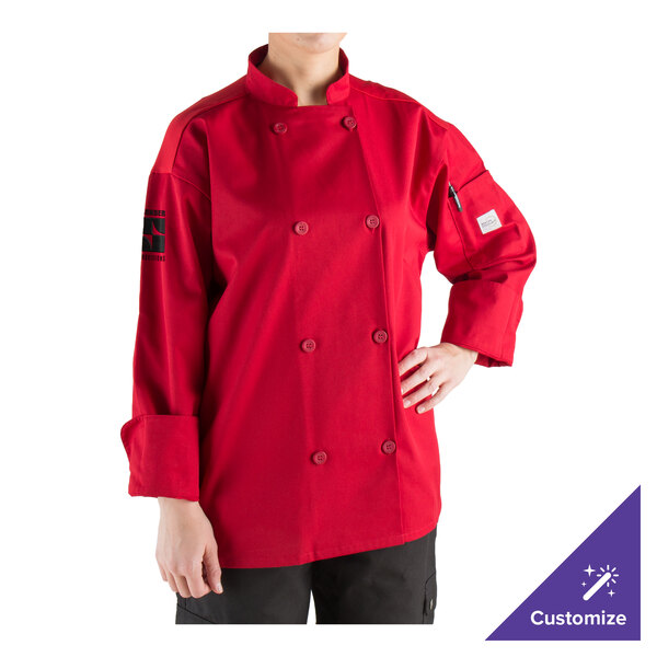 A woman wearing a Mercer Culinary red chef coat with full mesh back.