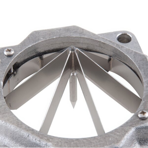 A metal Nemco Wedger blade with a circular center and six sections.